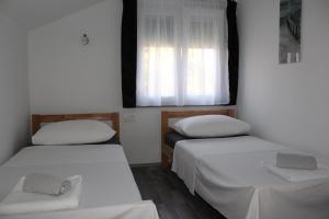 Posteľ alebo postele v izbe v ubytovaní Top Floor Apartment