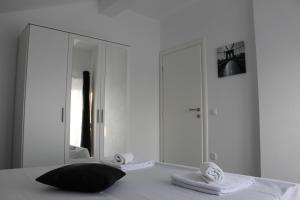 Posteľ alebo postele v izbe v ubytovaní Top Floor Apartment