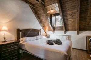 Llit o llits en una habitació de Casa Nere by SeaMunt Rentals