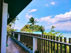 
A balcony or terrace at Orange Pearl Beach Resort

