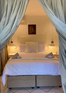 Кровать или кровати в номере Waterloo Guest House