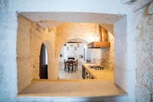 A kitchen or kitchenette at Charming Trulli