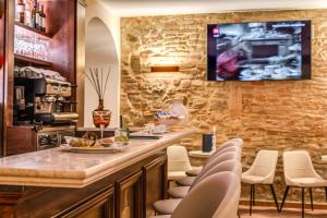 TV a/nebo společenská místnost v ubytování Abbazia Collemedio Resort & Spa