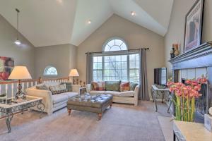 a living room with two couches and a fireplace at Less Than 1 Mi to Marina Family-Friendly Osage Beach Home in Osage Beach
