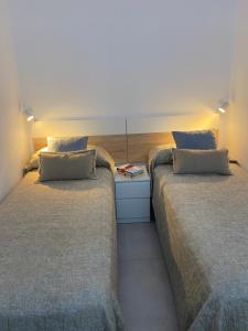 A bed or beds in a room at MY SUN LAS CANTERAS