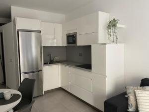 A kitchen or kitchenette at MY SUN LAS CANTERAS