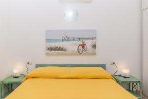 เตียงในห้องที่ Flat Orizzonte Rosso