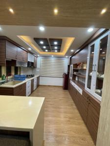 Cucina o angolo cottura di Welcome Home Bhaisepati