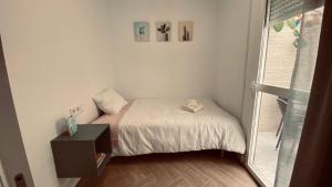 Postel nebo postele na pokoji v ubytování Cozy Nook