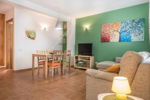 TV a/nebo společenská místnost v ubytování Casa Aigua Blava by SeaMount Rentals