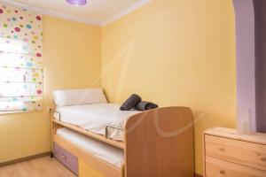 Postel nebo postele na pokoji v ubytování Casa Aigua Blava by SeaMount Rentals