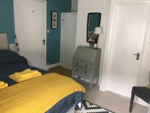 A bed or beds in a room at Turret House