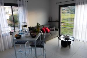 Posezení v ubytování Grand & beau studio climatisé vue sur mer