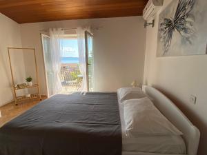 Postel nebo postele na pokoji v ubytování Studio apartman More