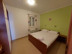 Postel nebo postele na pokoji v ubytování VeLun apartmani
