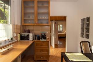 Kuchyňa alebo kuchynka v ubytovaní Sunbird Apartman Budapest