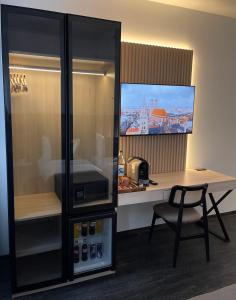 Kuchyň nebo kuchyňský kout v ubytování Bayer's City Hotel