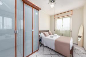 Posteľ alebo postele v izbe v ubytovaní Casa da Suite Evenka