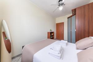 Posteľ alebo postele v izbe v ubytovaní Casa da Suite Evenka