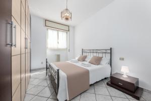 Posteľ alebo postele v izbe v ubytovaní Casa da Suite Evenka