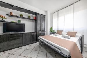 Posteľ alebo postele v izbe v ubytovaní Casa da Suite Evenka