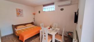 Postel nebo postele na pokoji v ubytování Guest House Barba