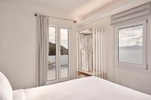 Posteľ alebo postele v izbe v ubytovaní Hill Club Naxos + 37 fotografií