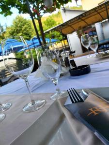 a group of wine glasses sitting on a table at Sobe na Jošanici in Jošanička Banja