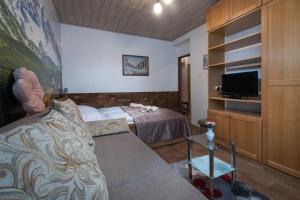 Postel nebo postele na pokoji v ubytování Byt Staré koliesko, Jasná, Demänovská Dolina