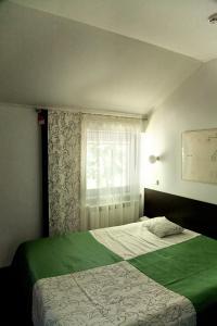Llit o llits en una habitació de MotelChuk