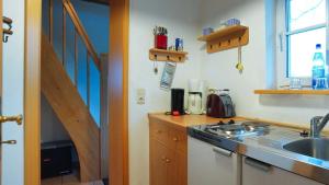 Köök või kööginurk majutusasutuses FerienGut Dalwitz Kitzklause
