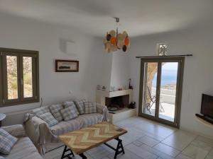 Posezení v ubytování Aegean Panorama in Tinos