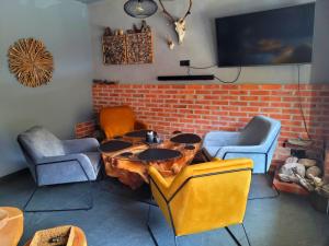 Posedenie v ubytovaní Apartament SPOKOLOKO Mysliwski