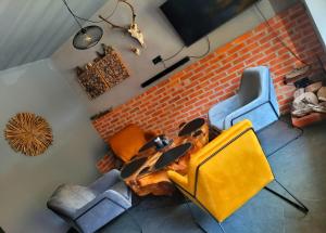 Posedenie v ubytovaní Apartament SPOKOLOKO Mysliwski