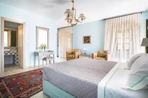 En eller flere senger på et rom på Luxury Villa Casa Maravillosa