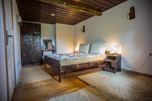 Ένα ή περισσότερα κρεβάτια σε δωμάτιο στο Guest House Stoilite