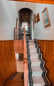 a spiral staircase in a house with a stair case at Villa paloma in Constanza