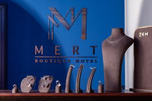 Certifikát, hodnocení, plakát nebo jiný dokument vystavený v ubytování Mert Boutique Hotel