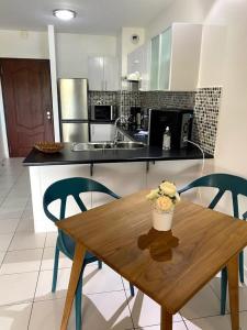 Una cocina o zona de cocina en Grand Studio Les Horizons Papeete