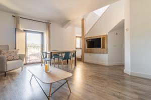 Χώρος καθιστικού στο Apartamentos El Patio Plaza Santa Clara Cáceres