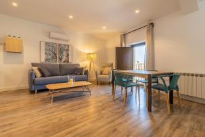 Χώρος καθιστικού στο Apartamentos El Patio Plaza Santa Clara Cáceres