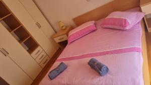 Postel nebo postele na pokoji v ubytování Apartment Nina