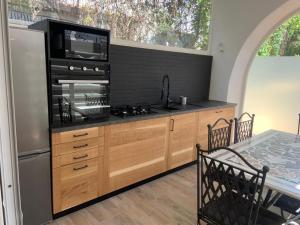 Kuchyň nebo kuchyňský kout v ubytování VILLA MATILDA luxury B&B