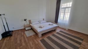 Posteľ alebo postele v izbe v ubytovaní Apartment Porta