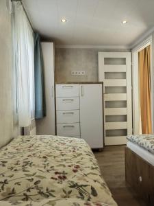Ένα ή περισσότερα κρεβάτια σε δωμάτιο στο Gemütliches Landhauswohnen rent-by-seibold