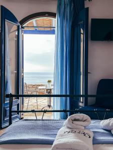 Postel nebo postele na pokoji v ubytování SERRAS ROOMS
