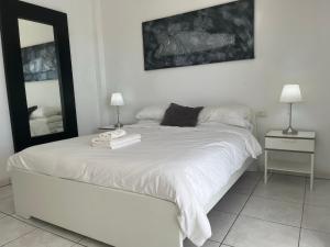 Postel nebo postele na pokoji v ubytování Villa Las Vistas Costa Adeje