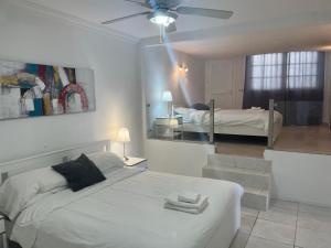 Postel nebo postele na pokoji v ubytování Villa Las Vistas Costa Adeje