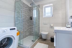 Kúpeľňa v ubytovaní Apartmani Utmar Cres