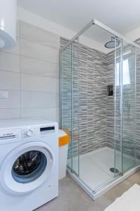 Kúpeľňa v ubytovaní Apartmani Utmar Cres